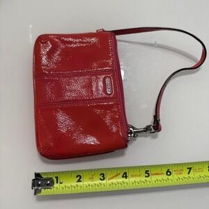 Coach orange/pink patent leather wristlet #wristlet #leather
